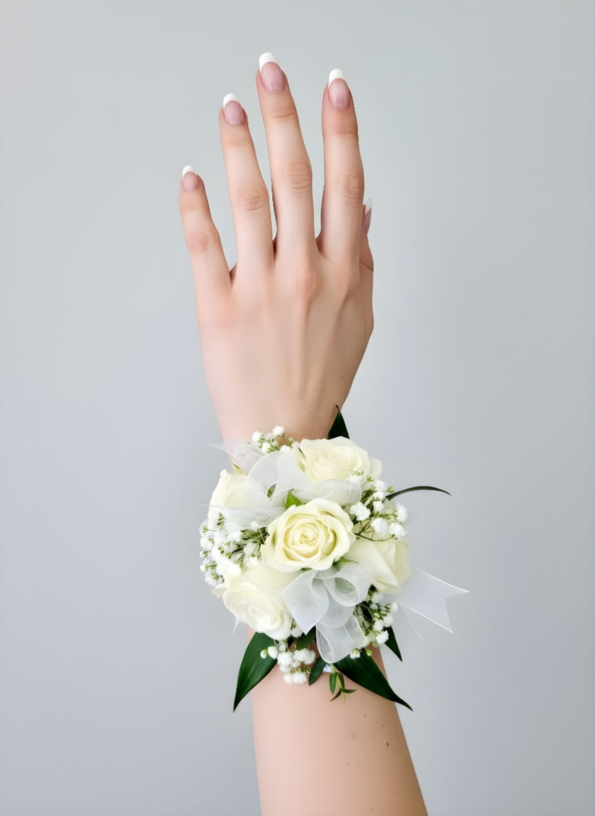 Spray rose corsage with three blooms, greenery, and matching ribbon in assorted colors